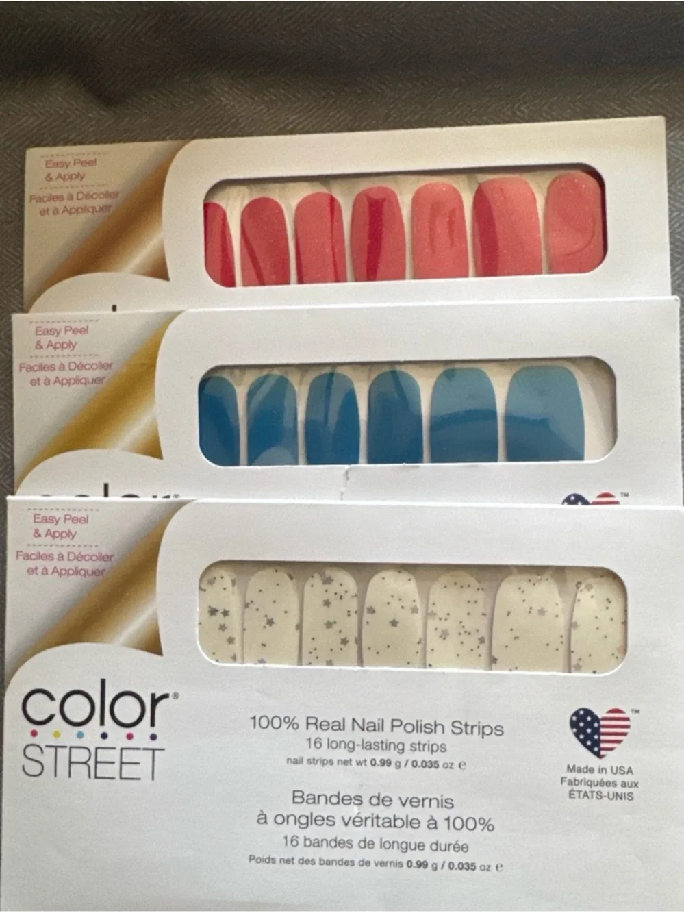 Color Street Nail Polish Strips - Red, Blue, Cream with Silver Stars - Picture 1 of 5